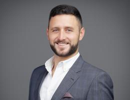 Agent Greg Charbein