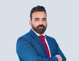 Agent Mustufa Dhenkar