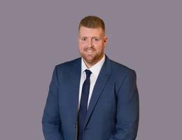 Agent Oliver Binns