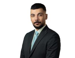 Agent George Roumie