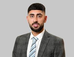 العميل Aaron Sandhu