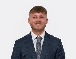 Agent Tom Corke