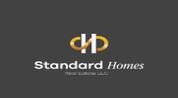 STANDARD HOMES REAL ESTATE L.L.C logo image