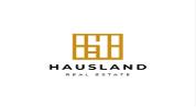 HAUSLAND REAL ESTATE - L.L.C logo image