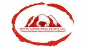 WHITE CAVES REAL ESTATE L.L.C logo image
