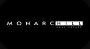 MONARCH HILL REAL ESTATE L.L.C logo image