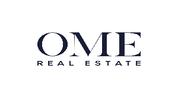 O M E REAL ESTATE L.L.C logo image