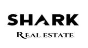 SHARK REAL ESTATE logo image