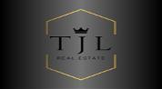 T J L REAL ESTATE L.L.C logo image