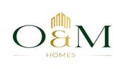 O AND M HOMES REAL ESTATE  - L.L.C - S.P.C logo image