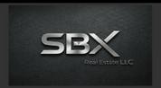S B X REAL ESTATE L.L.C logo image