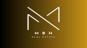 MBH REAL ESTATE logo image