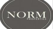 NORM PROPERTIES L.L.C logo image