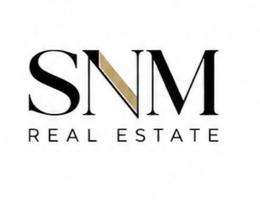SNM REAL ESTATE L.L.C