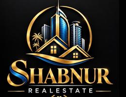 SHABNUR REAL ESTATE L.L.C logo image