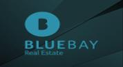 Blue Bay Real Estate logo image