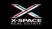 XSPACE REAL ESTATE logo image