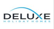 Deluxe Holiday Homes logo image