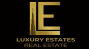 LUXURY ESTATES Real Estate logo image