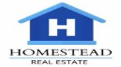 HOMESTEAD REAL ESTATE logo image