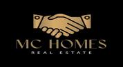 M C Homes Real Estate logo image