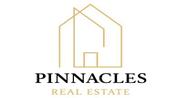 PINNACLES REAL ESTATE BROKERAGE logo image