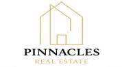 PINNACLES REAL ESTATE BROKERAGE logo image