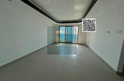 Apartment - 1 Bedroom - 2 Bathrooms for rent in Corniche Tower - Ajman Corniche Road - Ajman