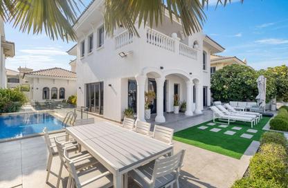 Villa - 5 Bedrooms - 7 Bathrooms for rent in Garden Homes Frond E - Garden Homes - Palm Jumeirah - Dubai