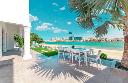 Villa - 5 Bedrooms - 7 Bathrooms for rent in Garden Homes Frond E - Garden Homes - Palm Jumeirah - Dubai