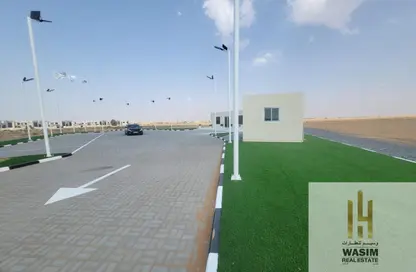 أرض - استوديو للبيع في بساتين السره - مشروع السرة السكني - أم القيوين