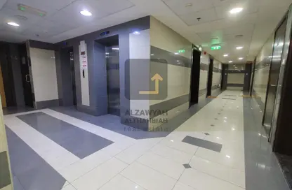 شقة - غرفة نوم - 2 حمامات للايجار في مجمع مويلح - تجارية مويلح - الشارقة