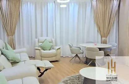 Apartment - 2 Bedrooms - 2 Bathrooms for sale in Orient Tower 1 - Orient Towers - Al Bustan - Ajman