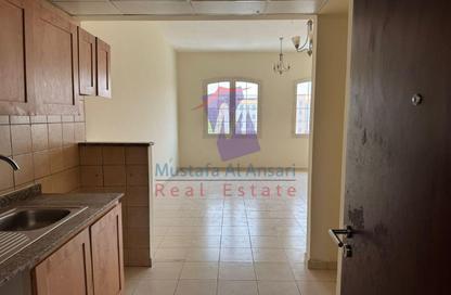 Apartment - Studio - 1 Bathroom for rent in Building Z01 - England Cluster - International City - Dubai