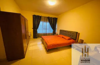 Apartment - 1 Bedroom - 2 Bathrooms for sale in Orient Tower 1 - Orient Towers - Al Bustan - Ajman