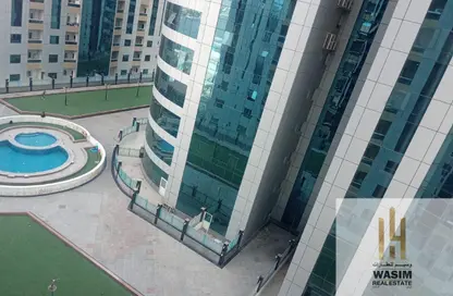 Apartment - 2 Bedrooms - 3 Bathrooms for sale in Orient Tower 2 - Orient Towers - Al Bustan - Ajman