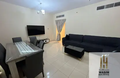 شقة - 2 غرف نوم - 2 حمامات للايجار في أورينت تاور 1 - أورينت تاور - البستان - عجمان