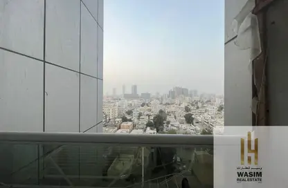 Apartment - 2 Bedrooms - 3 Bathrooms for sale in Orient Tower 1 - Orient Towers - Al Bustan - Ajman