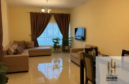 Apartment - 2 Bedrooms - 2 Bathrooms for sale in Orient Towers - Al Bustan - Ajman