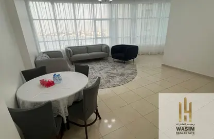 شقة - غرفة نوم - 2 حمامات للبيع في أورينت تاور 1 - أورينت تاور - البستان - عجمان