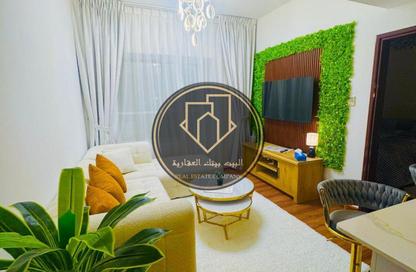 Apartment - 1 - 2 for sale in Mandarin Towers - Garden City - Ajman