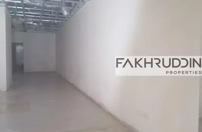 متجر - استوديو - 1 حمام للايجار في برج ترافلغار - منطقة مركز الأعمال - المدينة العالمية - دبي