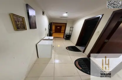 شقة - غرفة نوم - 2 حمامات للايجار في أورينت تاور 1 - أورينت تاور - البستان - عجمان