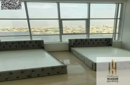 شقة - 2 غرف نوم - 2 حمامات للبيع في أورينت تاور 1 - أورينت تاور - البستان - عجمان