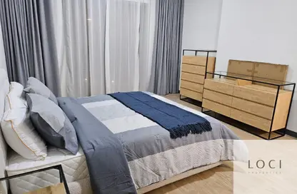 شقة - غرفة نوم - 2 حمامات للايجار في برج روكان B - برج روكان - روكان - دبي لاند - دبي