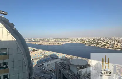 شقة - غرفة نوم - 2 حمامات للبيع في أورينت تاور 1 - أورينت تاور - البستان - عجمان