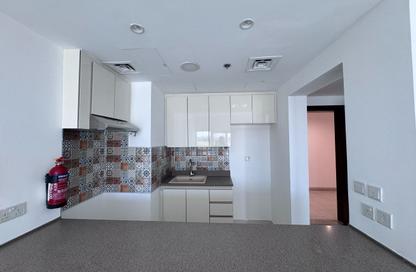 Apartment - 1 Bedroom - 2 Bathrooms for rent in Rabdan Building - Motor City - Dubai