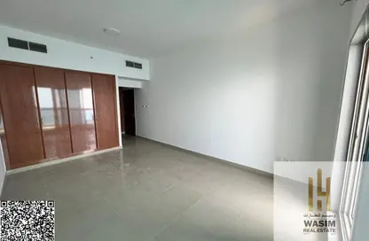 Apartment - 2 Bedrooms - 3 Bathrooms for sale in Corniche Tower - Ajman Corniche Road - Ajman