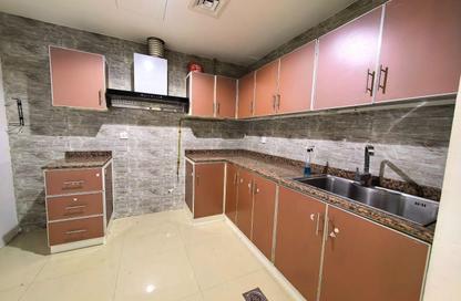 Apartment - 1 Bedroom - 2 Bathrooms for rent in Al Jawaher Building - International City Phase 2 - Al Warsan 4 - Al Warsan - Dubai