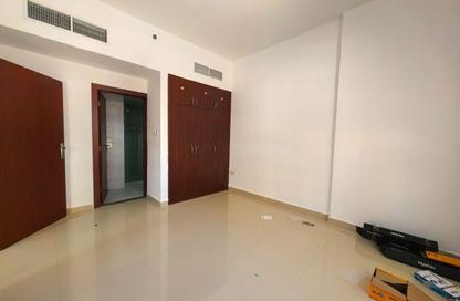 Apartment - 1 Bedroom - 2 Bathrooms for rent in Al Jawaher Building - International City Phase 2 - Al Warsan 4 - Al Warsan - Dubai